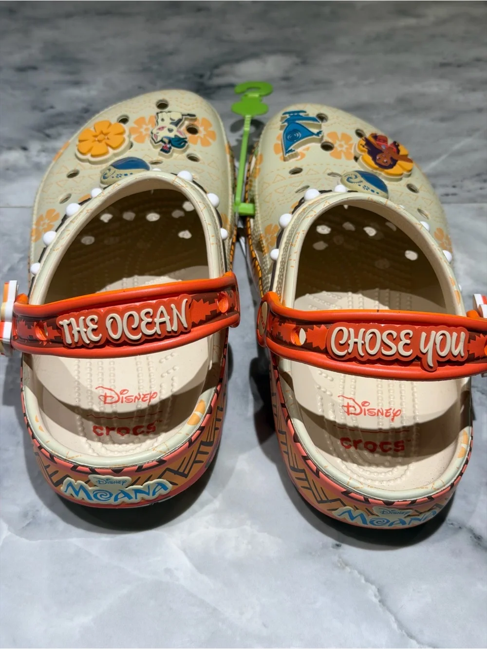 CROCS Kids Beige Orange Floral Moana Themed Clogs with Blue and orange Charms